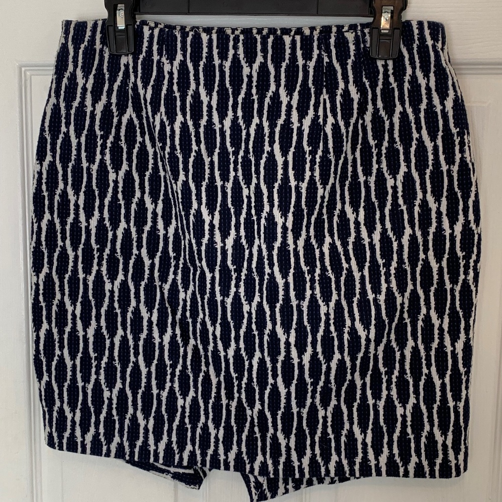 Blue and white patterned skirt with asymmetrical front